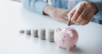 Person with pile of coins and piggy bank, money saving concept f Person with pile of coins and piggy bank, money saving concept for future use and financial stability, salary management, personal finance, investment savings.